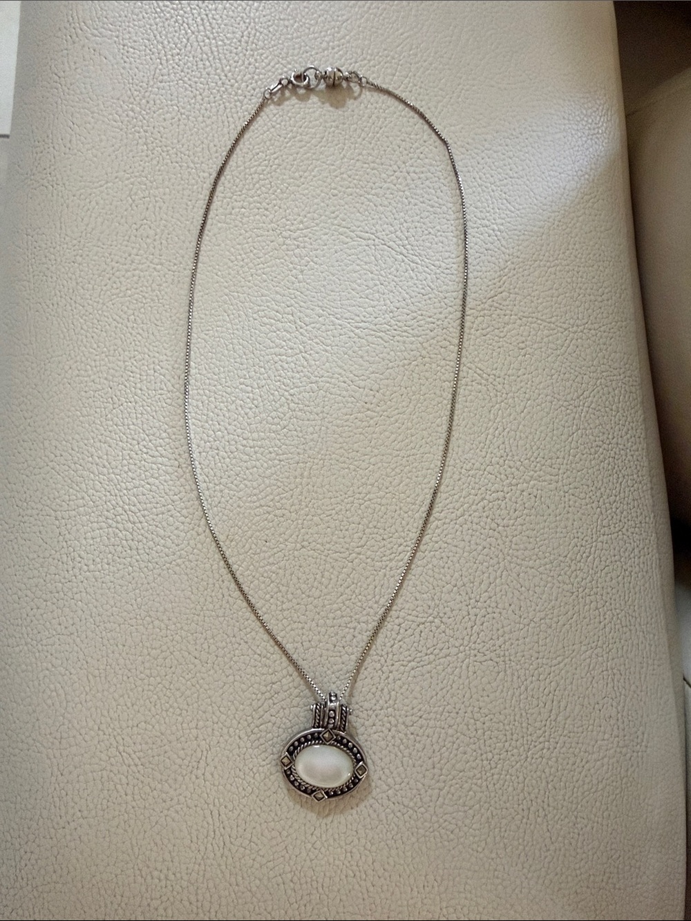 Sterling Silver Oval Pendant Necklace with White Stone